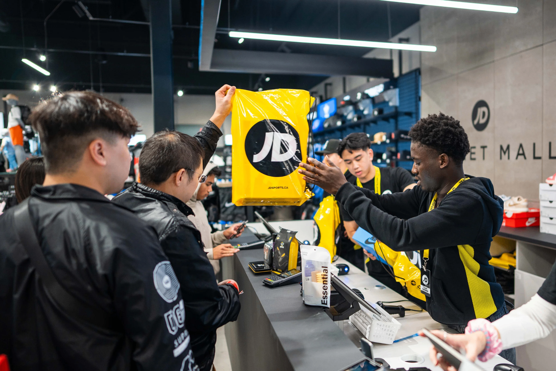 Member picking up their pair at JD Sports